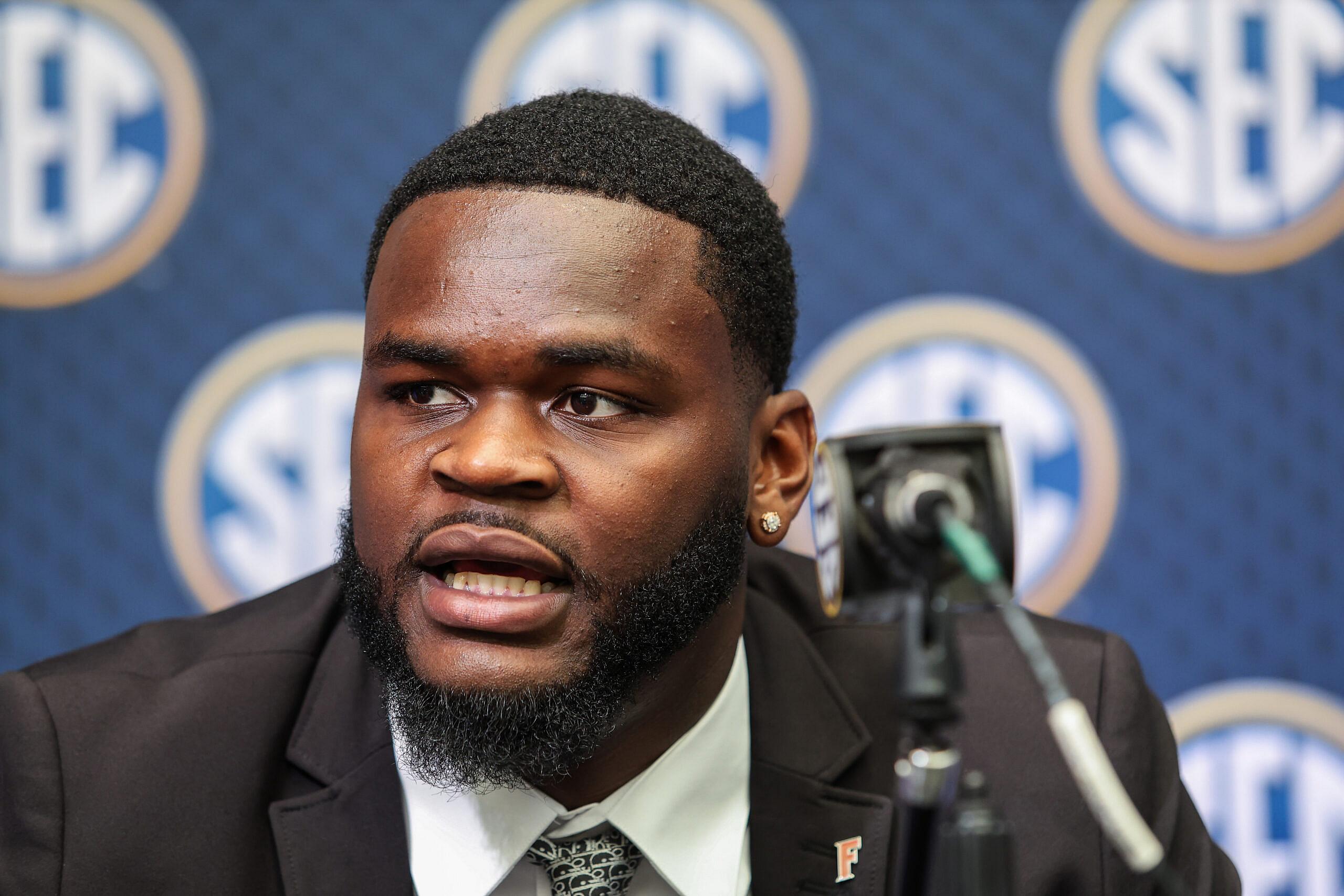 Caleb Banks speaks with reporters during SEC Media Days in Atlanta.