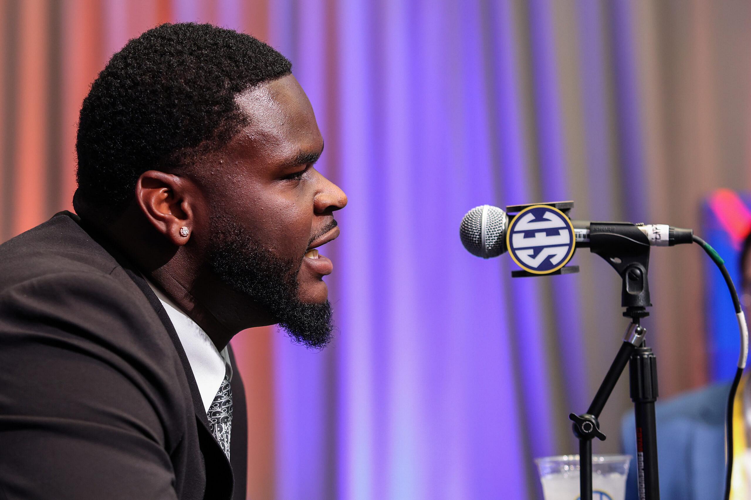 Caleb Banks answers questions from reporters during SEC Media Days in Atlanta.