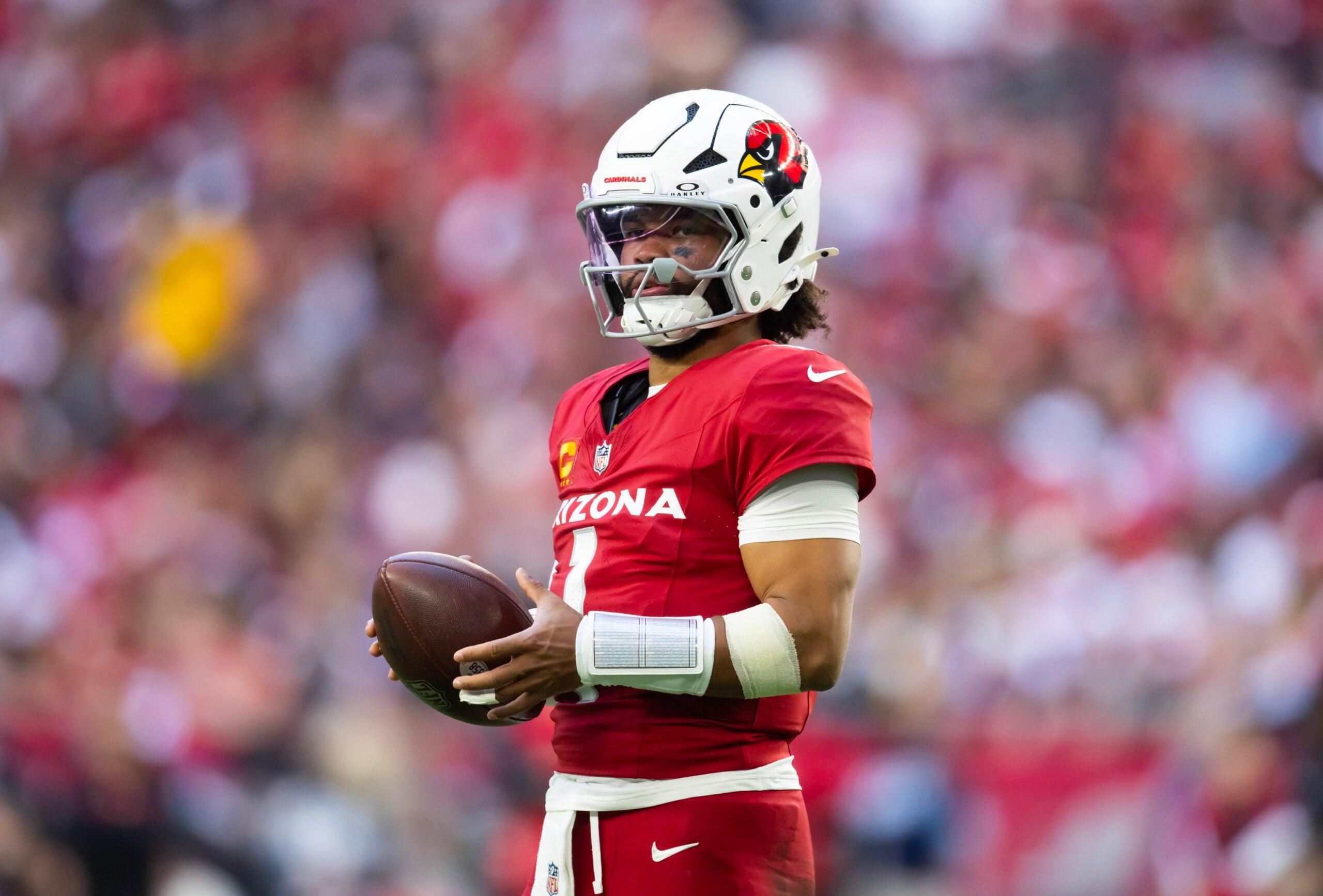 Kyler Murray stands on the field during a Cardinals game against the San Francisco 49ers.