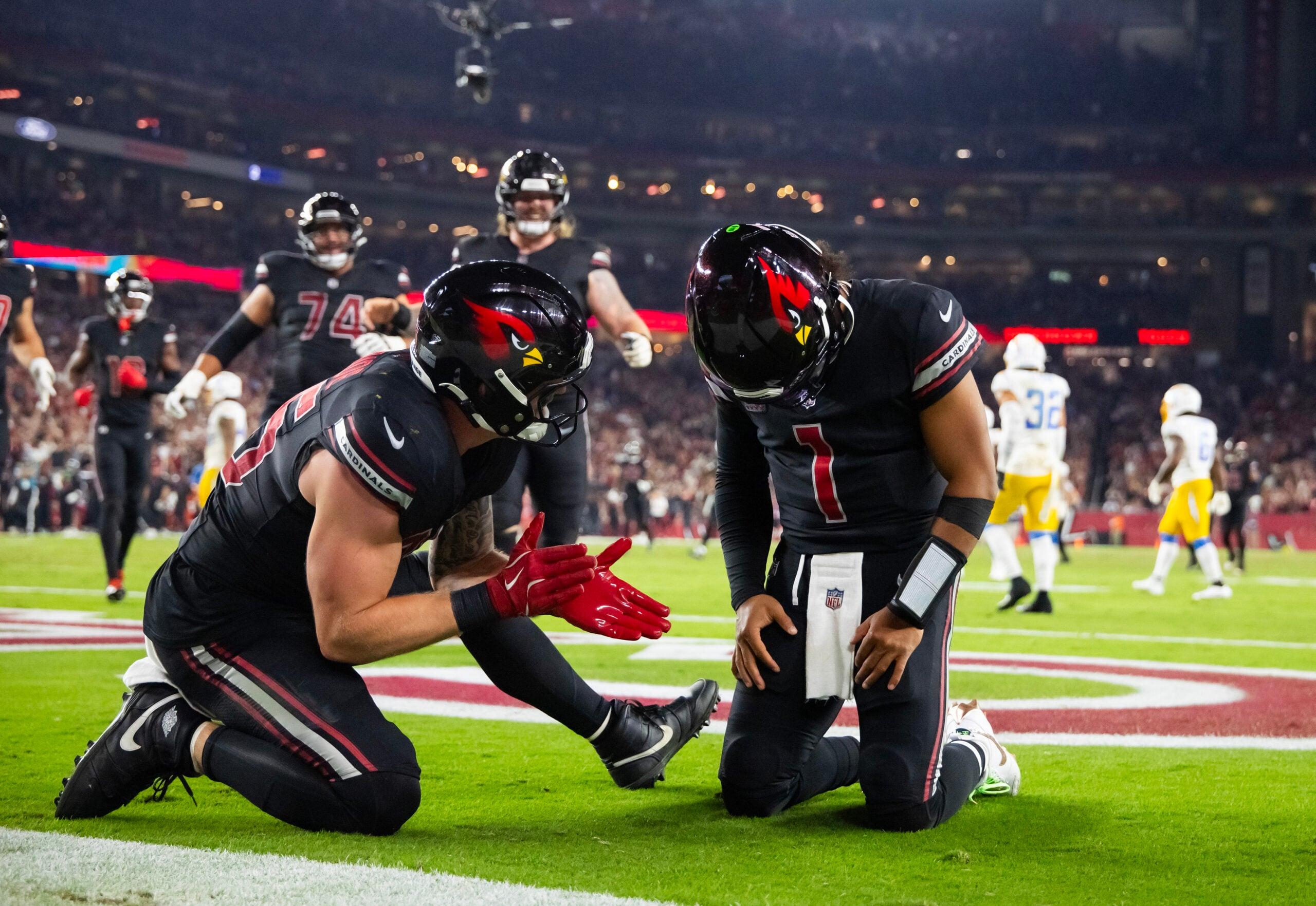 Kyler Murray and Trey McBride celebrate a TD in 2024