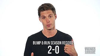 Man wearing black shirt displaying "Bump & Run Season Record 2-0" text