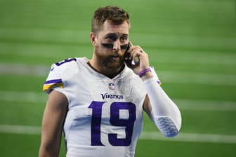 Adam Thielen stands on the field after the Vikings’ game at Ford Field.