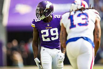 Vikings player number 29 in purple jersey during NFL game.