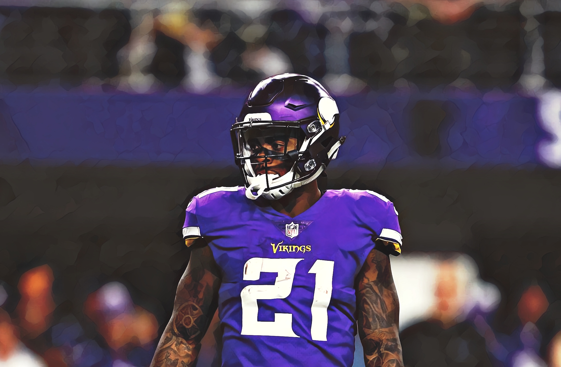 Vikings player wearing number 21 purple jersey during NFL game.