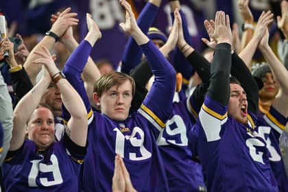 Minnesota Vikings fans react during a Thanksgiving game against the New England Patriots at U.S. Bank Stadium.