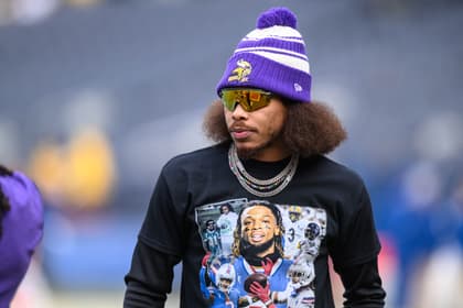 Justin Jefferson warms up wearing a Damar Hamlin tribute shirt before a Vikings game.