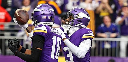Jordan Addison celebrates a touchdown with Justin Jefferson during the Vikings’ first quarter against the Falcons.