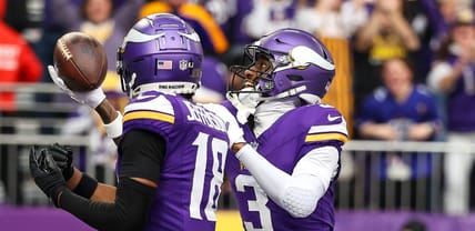 Jordan Addison celebrates a touchdown with Justin Jefferson during the Vikings’ first quarter against the Falcons.