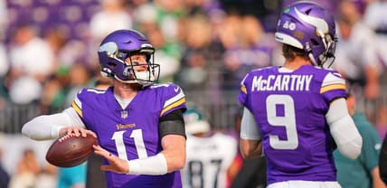 Carson Wentz warms up before the Vikings’ home game against the Eagles at U.S. Bank Stadium.