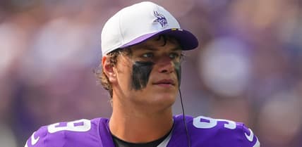 J.J. McCarthy stands on the Vikings’ sideline during the preseason game against the Texans.