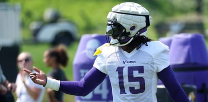 Dallas Turner takes part in linebacker drills at Vikings training camp.