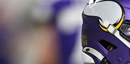 Brandon Powell runs the ball for the Vikings against the 49ers.