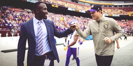 Kwesi Adofo-Mensah and Kevin O’Connell celebrate after the Vikings’ Week 9 win over the Commanders at FedEx Field.