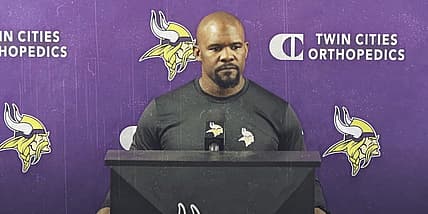 Brian Flores speaks to reporters at the Vikings’ TCO Performance Center.
