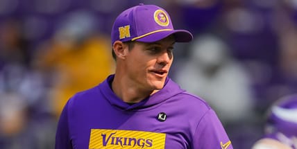 Kevin O’Connell stands on the sideline before Vikings vs. Texans game.