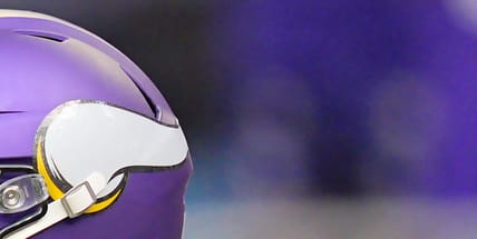 Carson Wentz warms up before the Vikings’ home game against the Eagles at U.S. Bank Stadium.