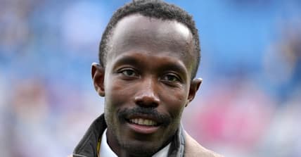 Kwesi Adofo-Mensah standing on the sideline during Vikings game at Croke Park.