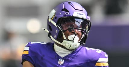 Myles Price returns a kickoff for the Vikings against the Patriots at U.S. Bank Stadium