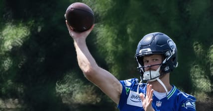 Seattle Seahawks quarterbacks Sam Darnold (14) and Drew Lock (2) run a passing drill during mini-camp on June 11, 2025, at the Virginia Mason Athletic Center in Renton, Washington. Mandatory Credit: Stephen Brashear-Imagn Images.