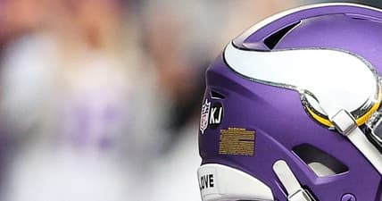 Jordan Addison stands on the field before a Vikings game against the Falcons at Mercedes-Benz Stadium.