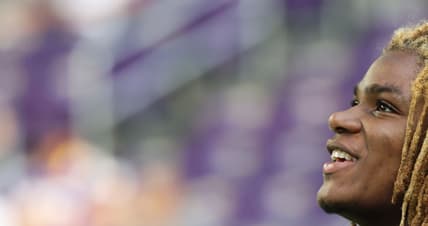 Lewis Cine looks on from the sideline before the Vikings’ preseason game against the 49ers at U.S. Bank Stadium.