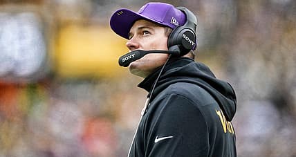 Kevin O’Connell watches from the Vikings sideline against the Packers.