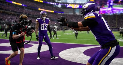 Justin Jefferson celebrates after scoring a touchdown against the Falcons.