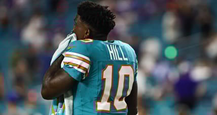 Tyreek Hill on field before Dolphins game against Bills at Hard Rock Stadium.