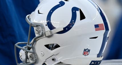 An Indianapolis Colts helmet sits on an equipment case during a game against the New England Patriots at Gillette Stadium.