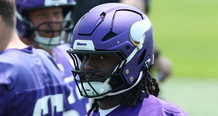 Donovan Jackson participates in Vikings minicamp drills at the team facility in Minneapolis