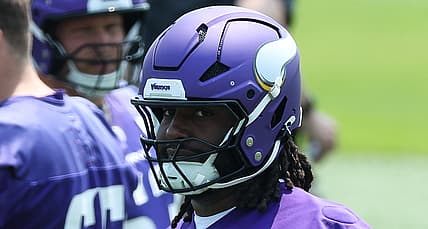 Donovan Jackson participates in Vikings minicamp drills at the team facility in Minneapolis