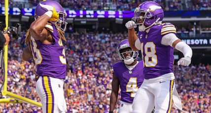Aaron Jones dances over a touchdown with Justin Jefferson vs. Texans.