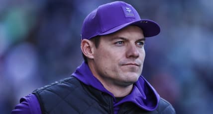 Kevin O’Connell watches warmups before a Vikings game against the Seattle Seahawks.
