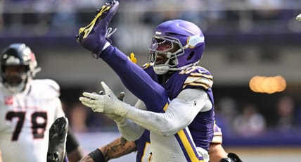Jonathan Greenard celebrates a fourth-quarter sack against the Texans at U.S. Bank Stadium.