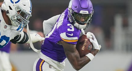 Jordan Addison runs after the catch against the Colts at U.S. Bank Stadium