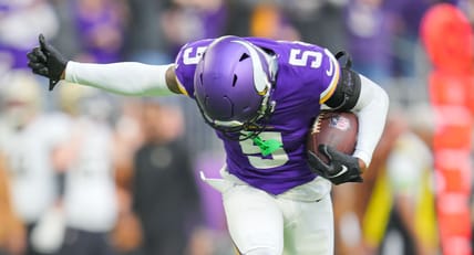 Mekhi Blackmon celebrates after intercepting a pass during a Vikings game against the Saints.