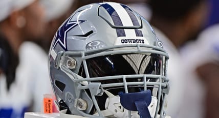 Dallas Cowboys helmet on sideline during game vs. Cardinals in 2023
