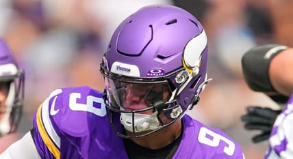 J.J. McCarthy throws a pass during a preseason game against the Raiders at U.S. Bank Stadium.
