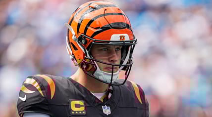 Joe Burrow drops back to pass against the Panthers at Bank of America Stadium.