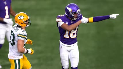 Justin Jefferson points during Vikings-Packers Week 18 action.