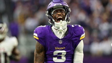 Jordan Addison celebrates fourth-quarter catch vs. Falcons at U.S. Bank Stadium.