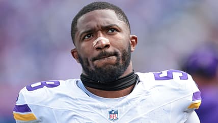 Jonathan Greenard watches from the sideline during a Vikings game against the Giants at MetLife Stadium.