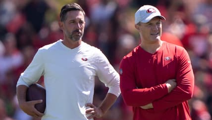 Kyle Shanahan and John Lynch in 2022