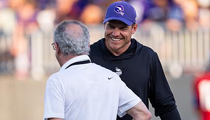 Kevin O’Connell talks with owner Ziggy Wilf during Vikings training camp