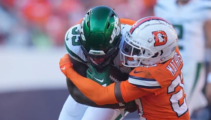 Denver CB Damrri Mathis tackling Dalvin Cook