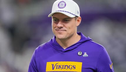 Kevin O’Connell walks on the field before a Vikings game at U.S. Bank Stadium.