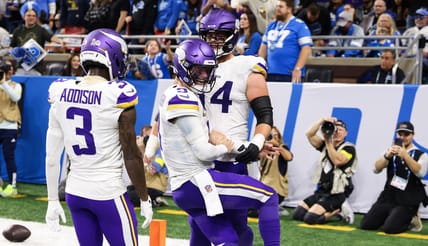 Vikings J.J. McCarthy scores a touchdown against the Lions in 2025