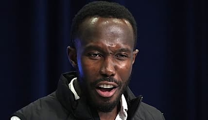 Kwesi Adofo-Mensah speaks at his podium during the 2024 NFL Scouting Combine.