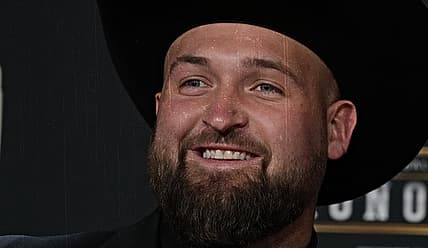 Dalton Risner poses on the red carpet before the NFL Honors in Phoenix.