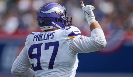 Minnesota Vikings defensive tackle Harrison Phillips (97) celebrates a defensive stop against the New York Giants on September 8, 2024, at MetLife Stadium.